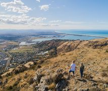 Two people on the Crater Rim looking out towards Christchurch.