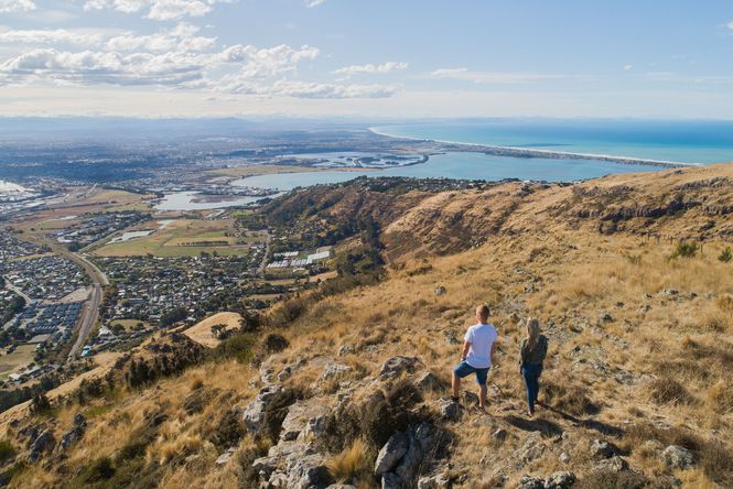 Two people on the Crater Rim looking out towards Christchurch.