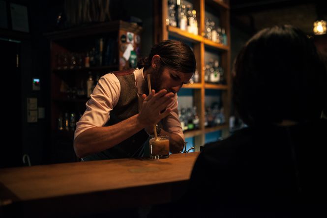 A bar man making a cocktail at Wonder Horse.
